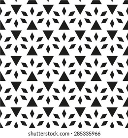 Vector seamless ethnic pattern with motifs in black and white colors.