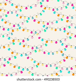 Vector seamless festive background with a pattern of color garlands light bulbs