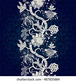 Vector seamless floral background. Border with tree branches and fantastic flowers. The motives of the paintings of ancient Indian fabrics. Dark backdrop. Tree of Life collection.