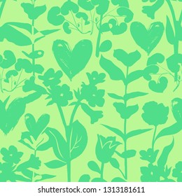 Vector seamless floral pattern with hearts and shapes of plants. Bold silhouettes on green background. Luxury valentine day background with heart, love symbol, flowers. Floral silhouette texture