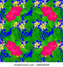 Vector seamless floral pattern with hibiscus flowers and leaves on a blue background.
