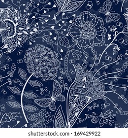Vector seamless floral pattern on a dark blue background.
