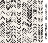 Vector seamless freehand pattern. Doodle monochrome print with hand drawn chevron texture. Trendy graphic design.