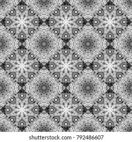 Vector seamless geometric pattern of black, white and gray tiles.