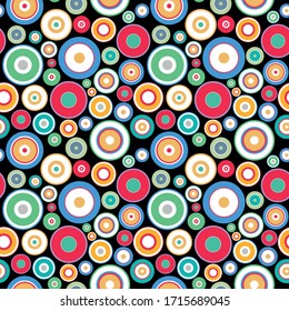 Vector seamless geometric pattern with colorful dots and circles. Bright fashion repeatable background. Modern stylish print.