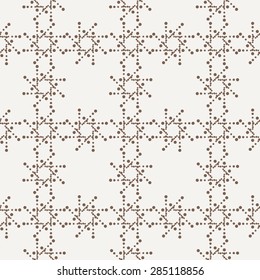 Vector seamless geometric pattern of dots of different sizes in two colors