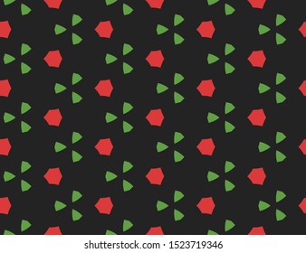 Vector seamless geometric pattern. Shaped red hexagons, green triangles on black background.