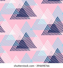 Vector seamless geometric pattern with striped triangles, abstract dynamic shapes in blue, pink, white colors. Hand drawn funky background with lines in 1990s fashion style. Modern tech textile print.