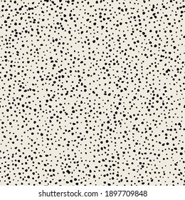 Vector seamless grainy pattern. Abstract background with tiny rough spots. Monochrome noisy texture. Randomly disposed sloppy organic mottle.