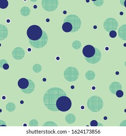 vector seamless graphical pistachio colored background with irregular polka dot with check and dark blue solid polka dot. Geometric modern background design. 