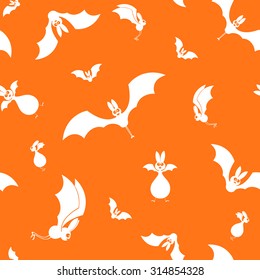 Vector seamless halloween bats silhouette on orange background