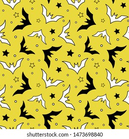 Vector seamless Halloween pattern with bats on yellow background. Simple halloween design for gift box, greeting card, wallpaper, fabric, web design.