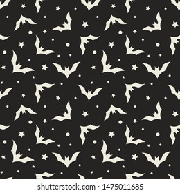 Vector seamless Halloween pattern with bats on black background. Simple halloween design for greeting card, gift box, wallpaper, fabric, web design.