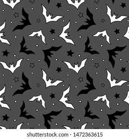 Vector seamless Halloween pattern with black and white bats on gray background. Simple design for gift box, greeting card, wallpaper, fabric, web design.