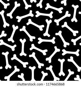 Vector seamless halloween pattern with white bones on a black background.