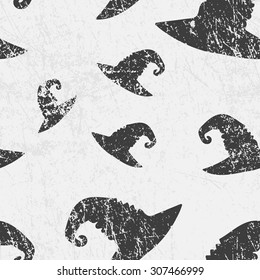 Vector seamless halloween pattern with witches magic hats. Grunge style, shabby street art imitation. Vintage old paper texture.