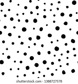 Vector seamless hand draw polka dot brush black and white pattern. Monochrome Scandinavian backgrounds of simple primitive with dots for textile design, for covers of notebooks and other