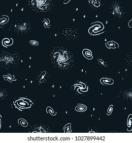 Vector seamless hand drawn galaxy background from spiral, elliptical, lenticular and irregular nebula. Space backdrop