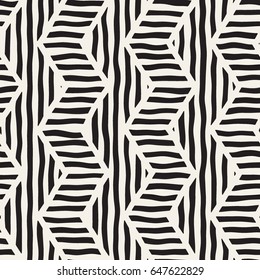 Vector seamless hand drawn pattern. Zigzag and stripe rough lines. Tribal design background. Ethnic black and white doodle texture.