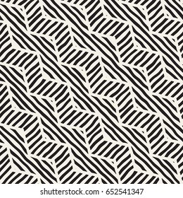 Vector seamless hand drawn pattern. Zigzag and stripe rough lines. Tribal design background. Ethnic black and white doodle texture.