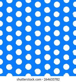 Vector seamless hand drawn polka dot pattern. Painted texture in vintage 1960s fashion style and classic colors - white and blue. Modern hipster background with big circles.