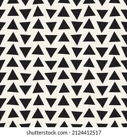 Vector seamless hand drawn triangles pattern. Repeating chaotic geometric elements. Stylish monochrome background design.