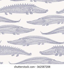 Vector seamless humorous pattern from doodle crocodile silhouette. Decorative zen tangle ornaments. Indigo blue thin contour lines on a light beige background. Batik painting. Textile monster print.