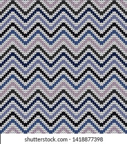 Vector seamless knitted decorative pattern varicolored zigzag