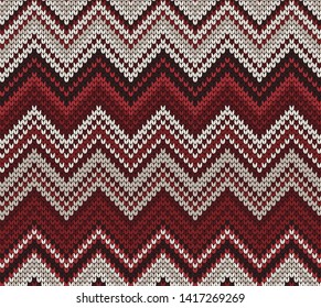 Vector seamless knitted pattern varicolored zigzag
