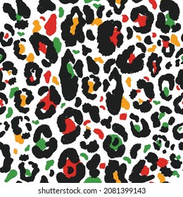 Vector seamless kwanzaa pattern with colored leopard print. Animal print. Cheetah african print on white background.