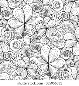 Vector Seamless Monochrome Floral Pattern with Decorative Clover and Coins. Hand Drawn Saint Patrick's Day Holiday Texture. Paisley Garden Style