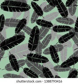 Vector seamless monochrome pattern of palm leaves and tropical plants. Exotic background for seasonal design.