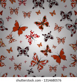 Vector. Seamless multicolored background with flying moths. Beautiful colorful butterflies chaotically fly on black, orange and white colors. Seamless background from bright butterflies.