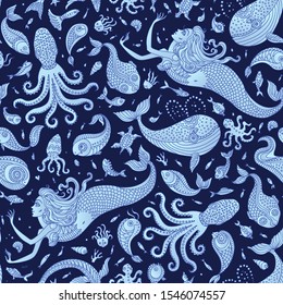 Vector seamless nautical fairy tale pattern. Fantasy mermaid, octopus, fish, sea animals blue silhouette with ornaments on a dark indigo background. Batik, wallpaper, textile print, wrapping paper