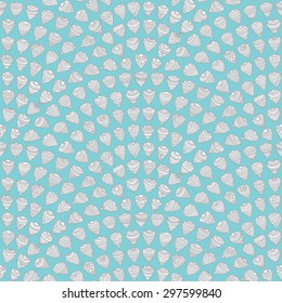 Vector seamless nautical pattern with geometrical fish scale layout. Light grey ornate drop-shaped Paisley elements on a turquoise background.