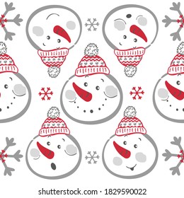 Vector seamless new year christmas pattern. Heads of snowmen in caps design for printing on paper, textiles, packaging, wallpaper.