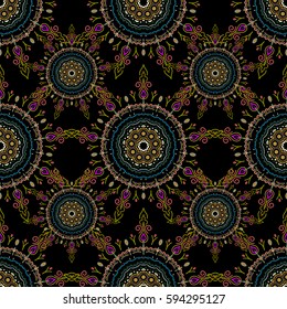 Vector seamless ornament in beige, yellow and green colors on a black background. Distressed damask seamless pattern background tile.