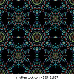 Vector seamless ornament in blue, green and orange colors on a black background. Distressed damask seamless pattern background tile.