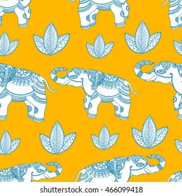 Vector seamless ornamental pattern with Indian elephant and floral elements on orange. Hand drawn fashion illustration in bohemian style for print, card,textile and other seamless trendy design. 