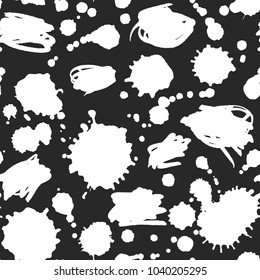 Vector seamless paint scribbles and blots pattern. Based on a graphic artwork. Classic white on black. Clipping paths included. The texture is on Swatches Panel and the style on Graphic Styles Panel.