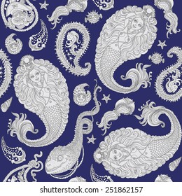 Vector seamless paisley pattern from blue-grey mermaids, pearls, anchors, sea shells jelly fish and funny morey on indigo blue background