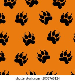 Vector seamless patern of tiger footprint. Wrapping paper, print, background.