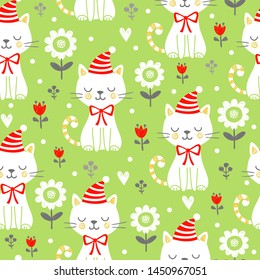 Vector seamless patterb with kittens and flowers on green background. Cute animal in cartoon style.