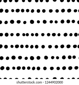 Vector seamless pattern. Abstract background with hand drawn dots pattern