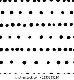 Vector seamless pattern. Abstract background with hand drawn dots pattern