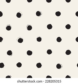 Vector seamless pattern. Abstract background with round brush strokes. Monochrome hand drawn texture. Stylish polka dot