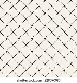 Vector seamless pattern. Abstract background with rhombuses. Small spots of brush strokes forming geometric ornament. Monochrome hand drawn texture