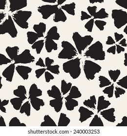 Vector seamless pattern. Abstract background with flowers made with brush strokes. Monochrome hand drawn texture. Artistic tileable theme with flowers