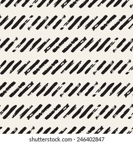 Vector seamless pattern. Abstract background with diagonal brush strokes which form regular stripes. Simple monochrome hand drawn texture