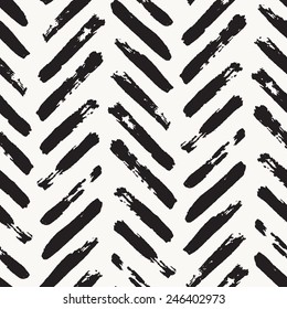 Vector seamless pattern. Abstract background with brush strokes. Monochrome hand drawn texture with herringbone